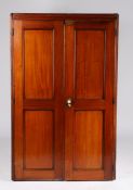 Victorian mahogany plan chest, the two panelled cupboard doors opening to reveal twelve interior