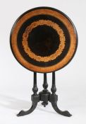 Victorian walnut, ebonised and marquetry inlaid tilt top occasional table, the circular top with