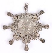 19th century white metal filigree metal pendant, with a central plaque depicting Christ being lifted