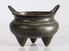 Chinese bronze censer, the circular body with arched handles and squat body, four character mark