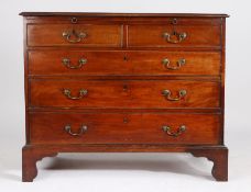 George III mahogany chest of two short and three long drawers, with brushing slide, on bracket feet,