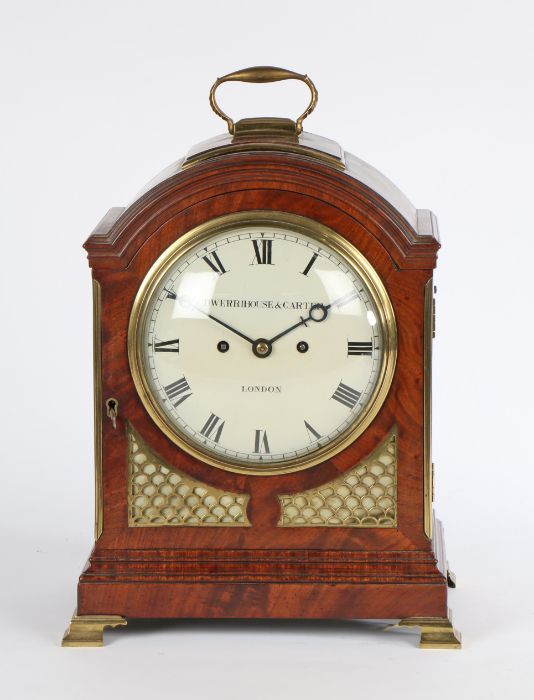 George III mahogany mantel clock, Dwerrihouse & Carter, London, the arched caddy top with brass