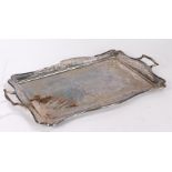 Art Nouveau silver plated tray, with a pair of handles above a pierced border and a embossed design,