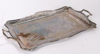 Art Nouveau silver plated tray, with a pair of handles above a pierced border and a embossed design,