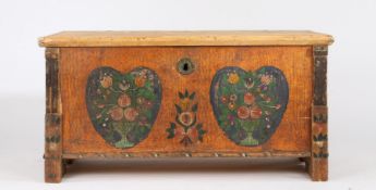 19th Century pine marriage chest, the hinged lid above a painted front depicting two heart shaped