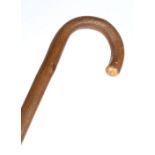 Early 20th century swordstick by Bacon Brothers of Cambridge, the knotted brown wooden stock and