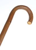 Early 20th century swordstick by Bacon Brothers of Cambridge, the knotted brown wooden stock and