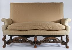 William and Mary style settee, the rectangular upholstered back above scrolled arms and loose