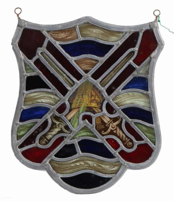 A stained glass panel, of shield shape, designed with crossed swords, 24cm wide, 28cm high - Image 2 of 3