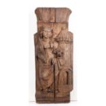 A 15th century carved oak panel of Saint Barbara, circa 1500 Possibly a pew-end or part of an