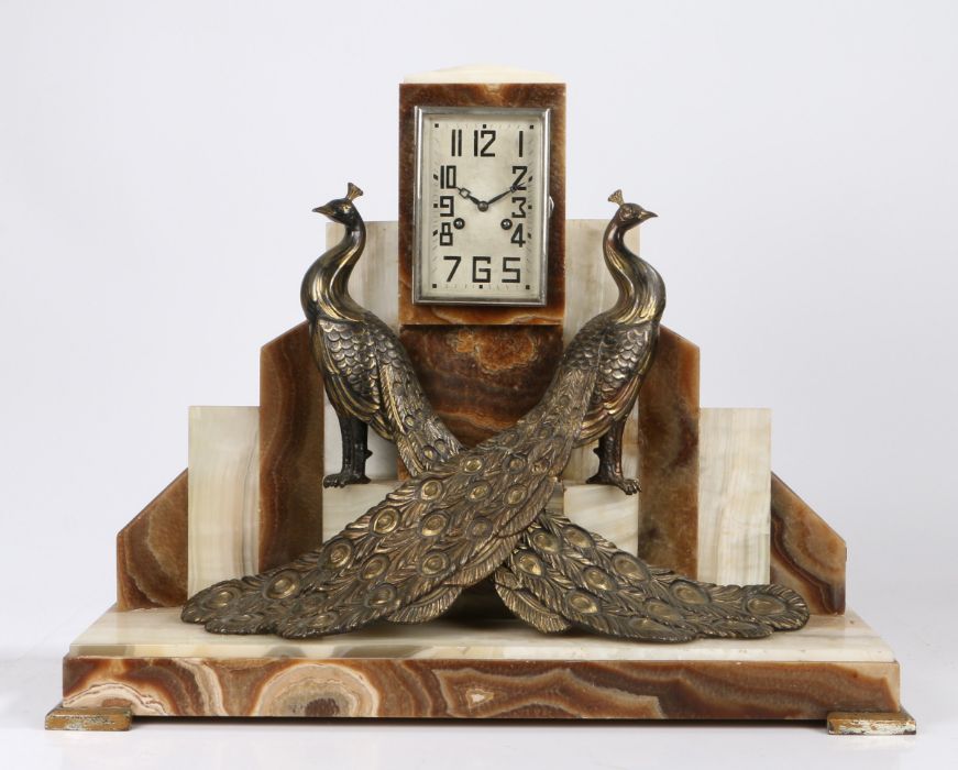 Substantial Art Deco marble mantle clock, the white dial with angular Arabic numerals, the brown and