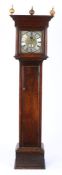 A George III oak longcase clock By William Granshaw, having a square glazed hood flanked by