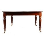 Victorian mahogany dining table, the rectangular top with rounded corners and three additional