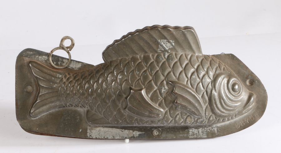 Two piece mould modelled as a fish with raised dorsal fin, stamped "G DEHAECK DELBAERE GAND", 24cm