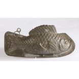 Two piece mould modelled as a fish with raised dorsal fin, stamped "G DEHAECK DELBAERE GAND", 24cm