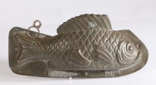 Two piece mould modelled as a fish with raised dorsal fin, stamped "G DEHAECK DELBAERE GAND", 24cm