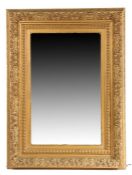 Victorian gilt framed wall mirror, the acanthus leaf, beaded and foliate frame housing the