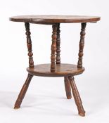 A mid-18th century oak and ash cricket-type two-tier table, English, circa 1750 Having a circular