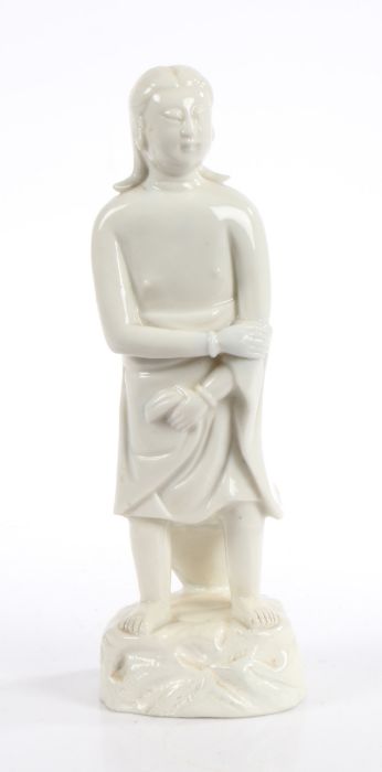 Chinese Blanc De Chine porcelain figure, circa 1700, modelled as "Adam" with his modesty covered