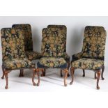 Set of six George III mahogany dining chairs, with foliate needlework upholstered backs and seats,