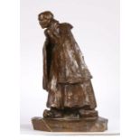 19th/20th century Dutch bronze depicting an elderly woman wearing a cloak and clogs, her hands