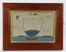 Victorian woolwork picture, of a three mast ship in a shield flanked by two further ships and the