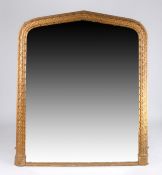 Victorian gilt overmantle mirror, the triangular pediment and frame with leaf and stylised berry