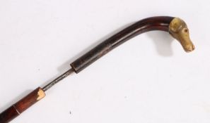 Late Victorian sword stick, the wooden cane with carved horn pommel in the form of a dog's head,