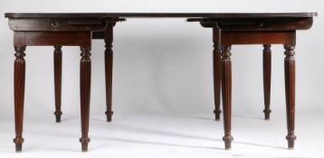 George III mahogany campaign style dining table, the rectangular top with reeded edge and rounded
