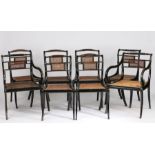 Set of eight Regency ebonised dining chairs, consisting of six single and two carver chairs, the