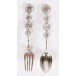 Chinese silver fork and spoon, maker HM, the handles each with four pierced characters, 13cm long,