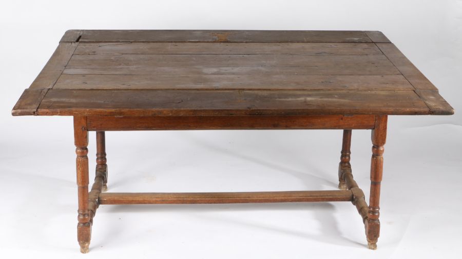 An early 18th century oak draw-leaf table, French, circa 1730 Having a triple boarded and end- - Image 2 of 2