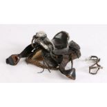 South American miniature leather saddle, with silver capped pommel, leather stirrups, and