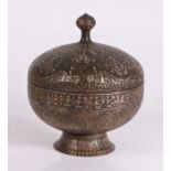 Islamic metal pot and cover, the lid and body with figural decoration, 24cm high