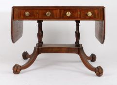 Regency mahogany, ebony and boxwood strung sofa table, with two drop leaves and four frieze drawers,