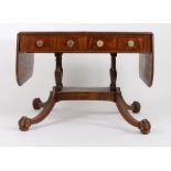 Regency mahogany, ebony and boxwood strung sofa table, with two drop leaves and four frieze drawers,