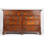 George III oak and mahogany banded mule chest, the hinged top above three simulated drawers and