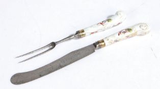 Chelsea gold anchor period knife and fork, circa 1765, the pistol grip handles with polychrome