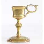 19th Century brass candle snuffer stand, with loop handle, knopped stem and square base with