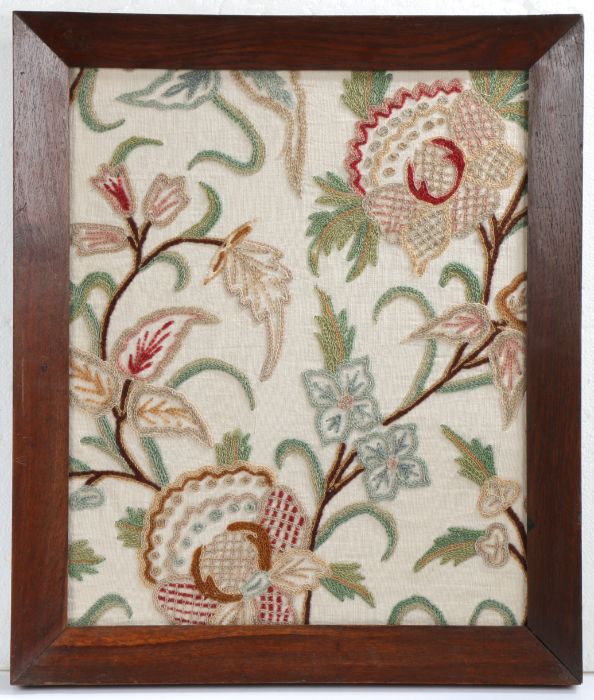 19th century crewel work panel depicting floral scenes housed within a oak and glazed frame, 58cm by