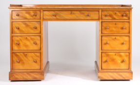 Victorian satinwood desk by Morison & Co, the three-quarter galleried top above three frieze drawers