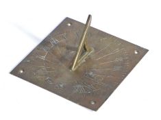 20th Century brass sundial, the pierced brass gnomon above a square base plate with cast Roman