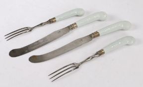 Two pairs of Royal Worcester Chrysanthemum pattern knives and forks, circa 1775, with texture pistol