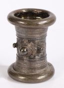 Kachin Burma silver ceremonial bracelet, of waisted form with filigree scroll decoration and three