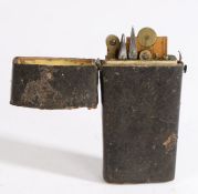 Early 19th Century leather etui, the hinged lid opening to reveal a fitted interior containing