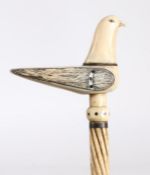 19th Century whalebone cane, the seagull form handle above a spiral and diamond carved tapering