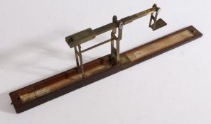 Early 19th Century folding guinea balance by Wilkinson of Ormskirk, the folding scale housed in a