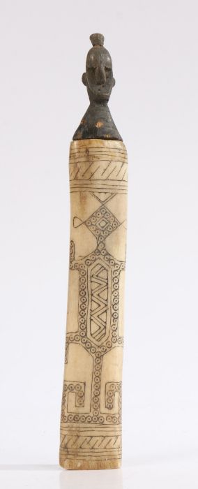 19th Century Congolese bone and wood pot and cover, the carved wooden figural lid above the bone