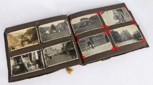 Early 20th Century photograph and postcard album, containing black and white photographs of