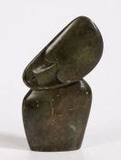 Zimbabwean Shona carved serpentine figure by Gift Muza, depicting a lady with her head angled to one